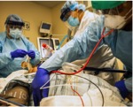 Description: Physicians at Mount Sinai Medical University Hospital in New York treating acutely ill patients infected with the new coronavirus (courtesy of Mount Sinai Health System)